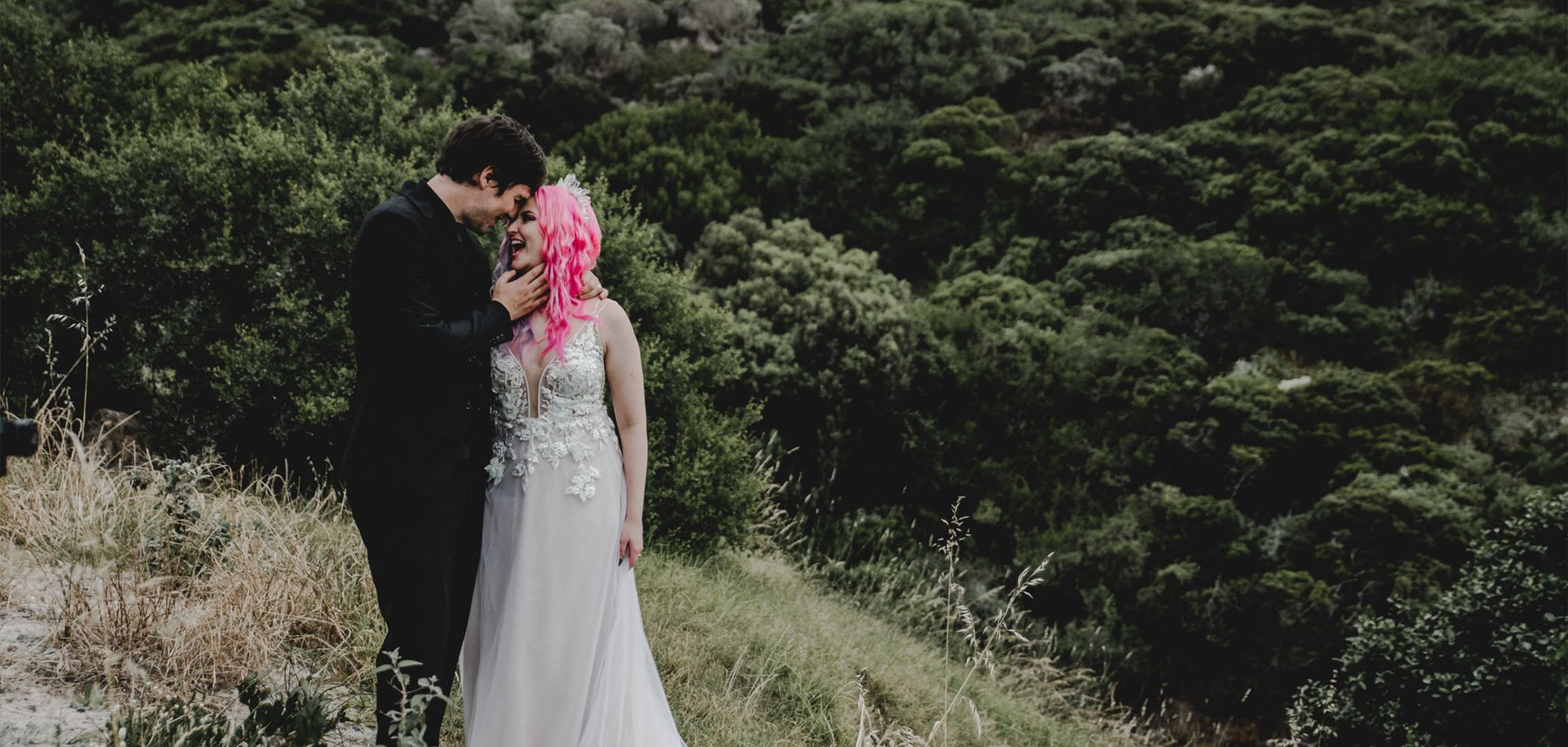 Laughing pink haired bride with groom Molteno Couture designer bridal cape town gothic wedding forrest