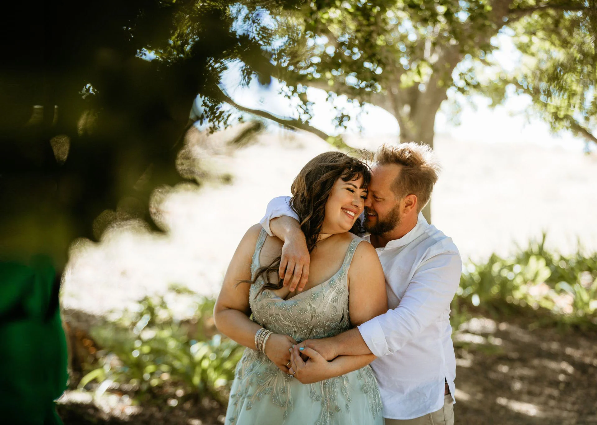 Laughing couple on their wedding day Molteno Couture designer bridal cape town bride wedding custom made