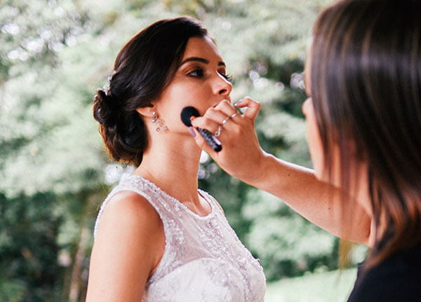 Make up applied to bride